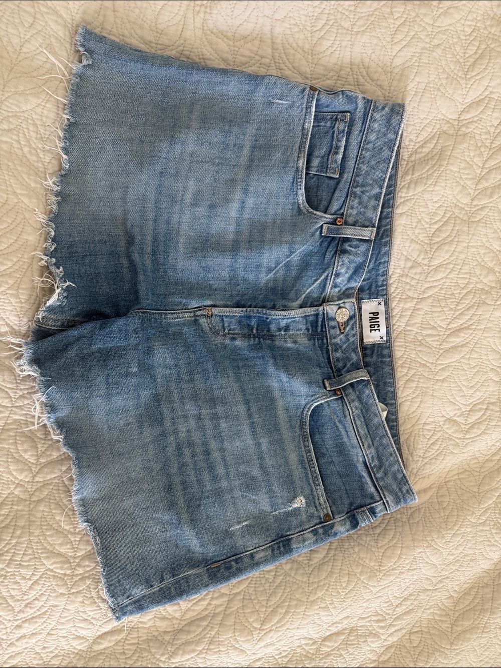 PAIGE Light Wash Distressed Denim Cutoff Shorts